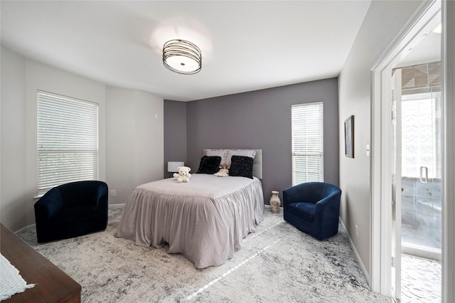 bedroom with carpet and baseboards