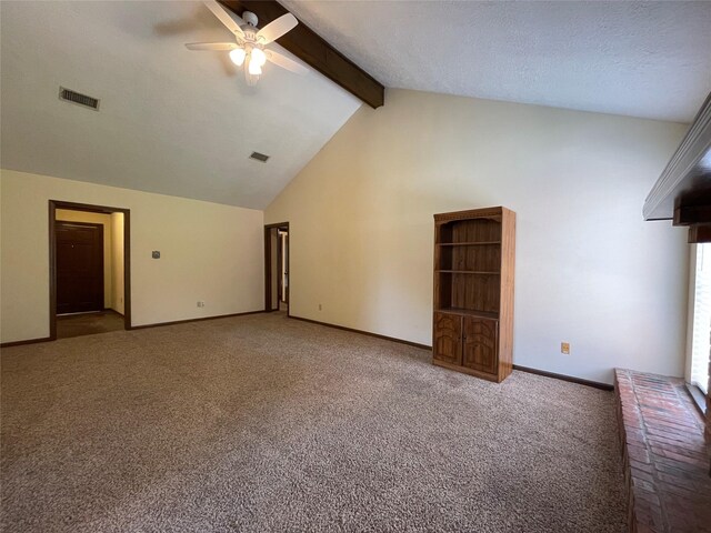 unfurnished living room featuring vaulted ceiling with beams, baseboards, visible vents, ceiling fan, and carpet floors