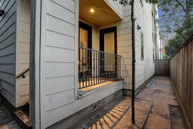 view of home's exterior featuring fence
