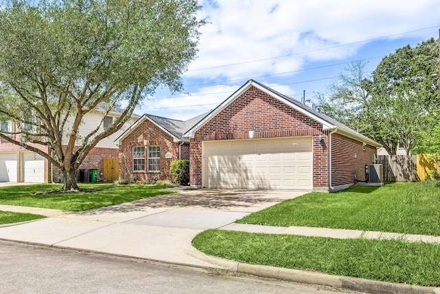 6723 Cypress Glades Dr, Katy, TX 77449 - view of front facade with fence, driveway, brick siding, a front yard, and a garage