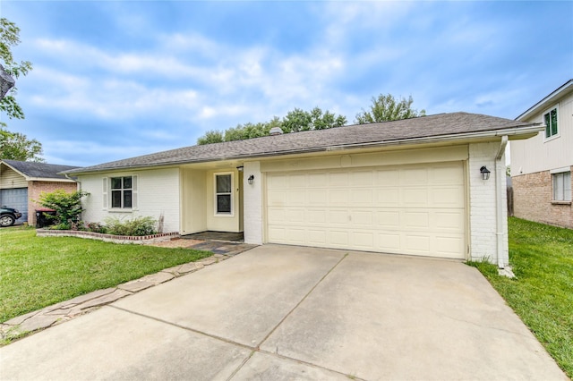 ranch-style house with brick siding, a front lawn, and concrete driveway