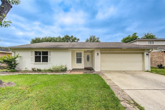 ranch-style home with a front lawn, driveway, brick siding, an attached garage, and a shingled roof