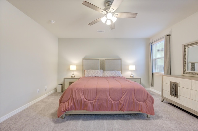 bedroom featuring baseboards, a ceiling fan, carpet flooring, and visible vents