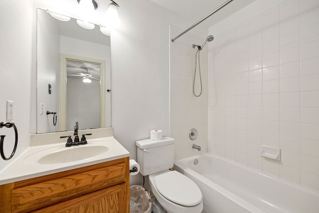 bathroom featuring vanity, a ceiling fan, shower / bathtub combination, and toilet