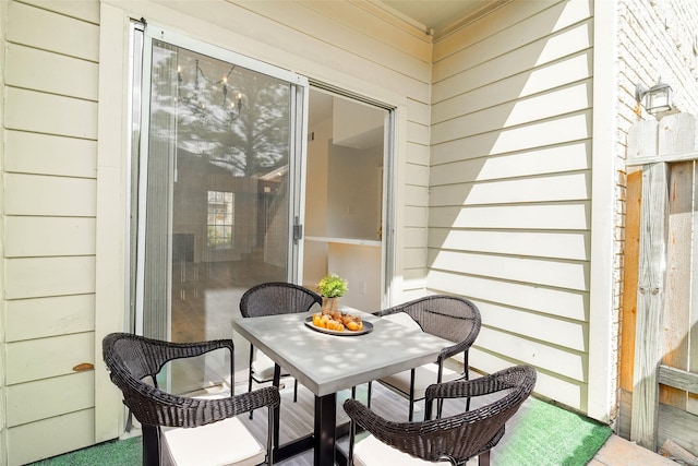 balcony featuring outdoor dining area