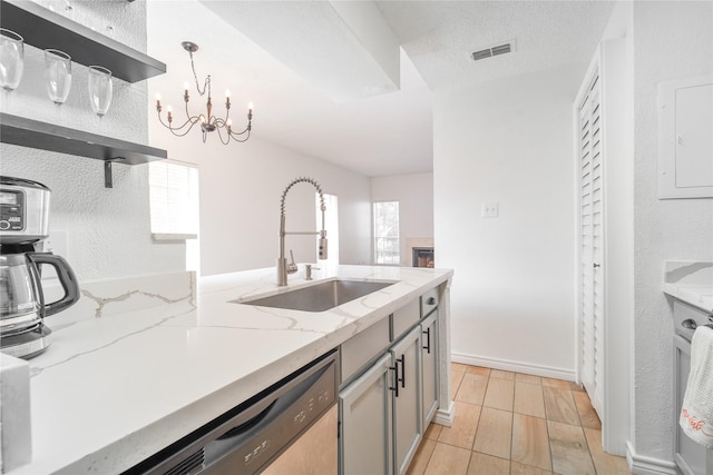 kitchen with open shelves, a sink, electric panel, dishwasher, and visible vents