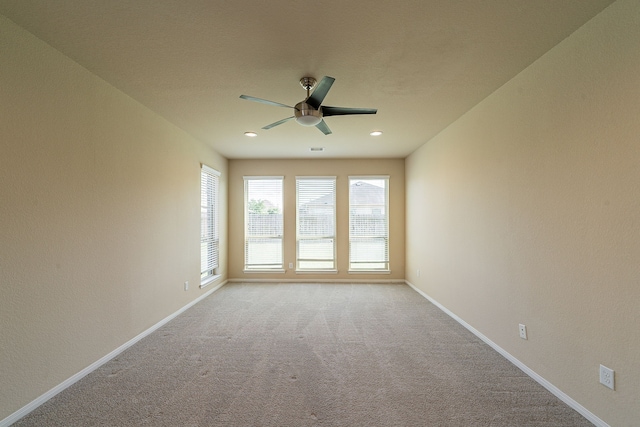 18922 Deer Trace Dr, Crosby, TX 77532 - carpeted spare room with visible vents, baseboards, recessed lighting, and ceiling fan