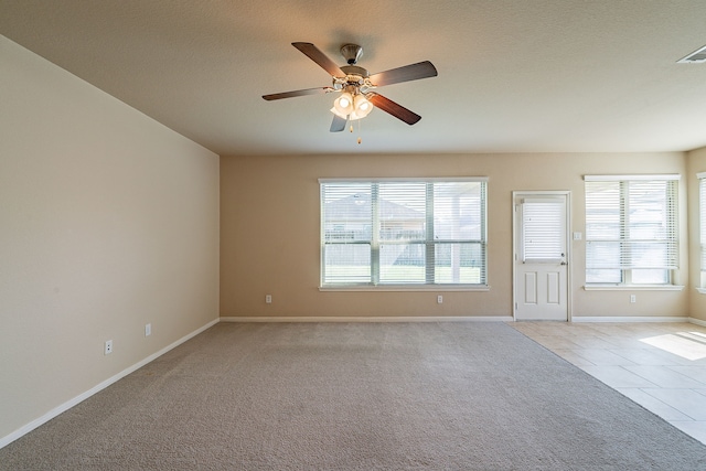 18922 Deer Trace Dr, Crosby, TX 77532 - carpeted empty room with plenty of natural light, a ceiling fan, and baseboards
