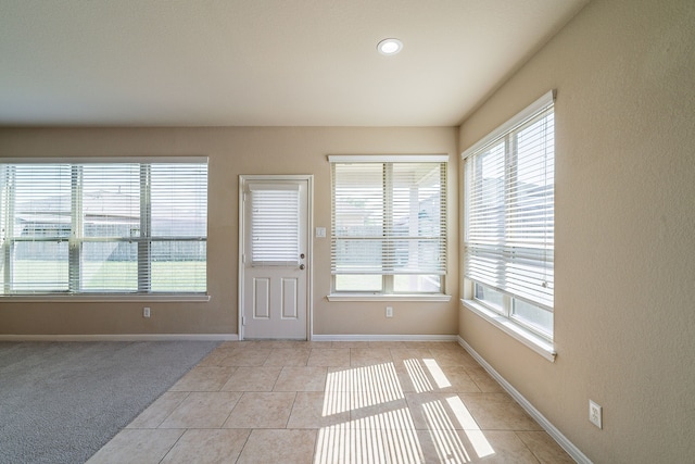 18922 Deer Trace Dr, Crosby, TX 77532 - entryway featuring baseboards, a healthy amount of sunlight, light tile patterned flooring, and recessed lighting