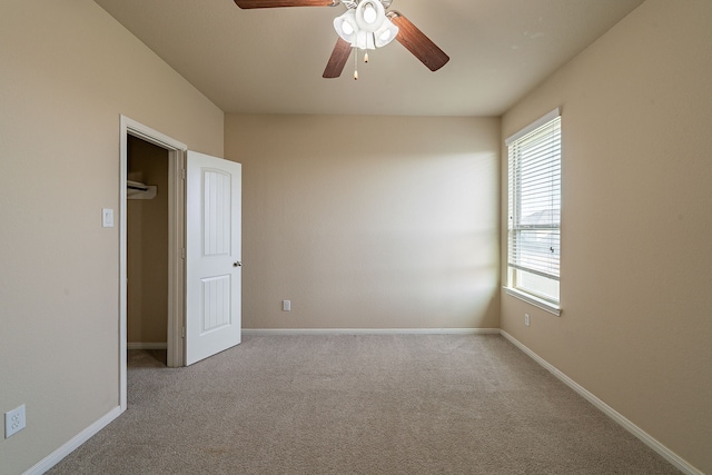 18922 Deer Trace Dr, Crosby, TX 77532 - spare room featuring carpet flooring, ceiling fan, and a healthy amount of sunlight