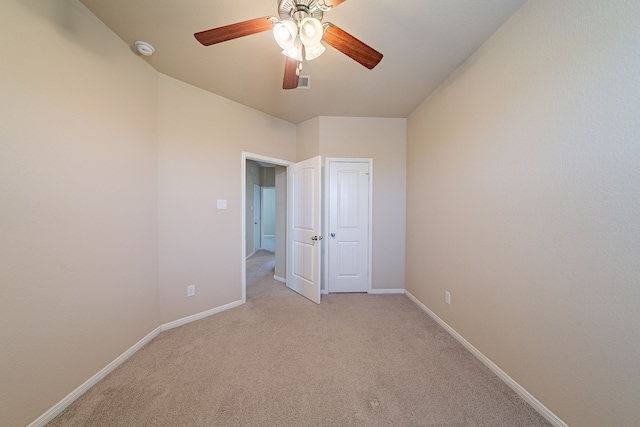 18922 Deer Trace Dr, Crosby, TX 77532 - unfurnished bedroom featuring visible vents, light carpet, a ceiling fan, and baseboards