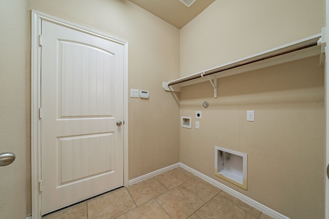 18922 Deer Trace Dr, Crosby, TX 77532 - washroom featuring electric dryer hookup, light tile patterned floors, laundry area, hookup for a gas dryer, and washer hookup