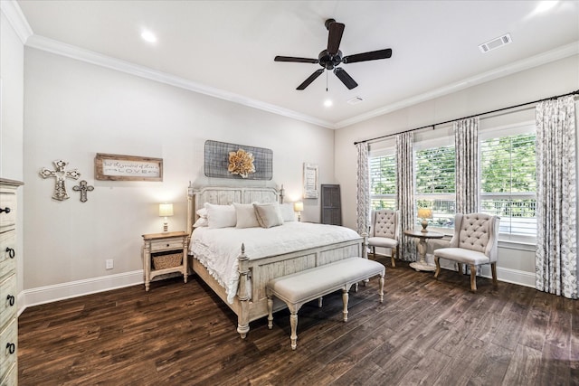 bedroom featuring crown molding, baseboards, visible vents, and dark wood-type flooring