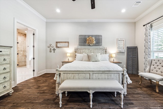 bedroom with crown molding, ensuite bathroom, dark wood finished floors, and visible vents