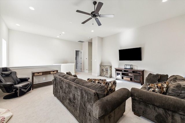 carpeted living area featuring recessed lighting, ceiling fan, and visible vents