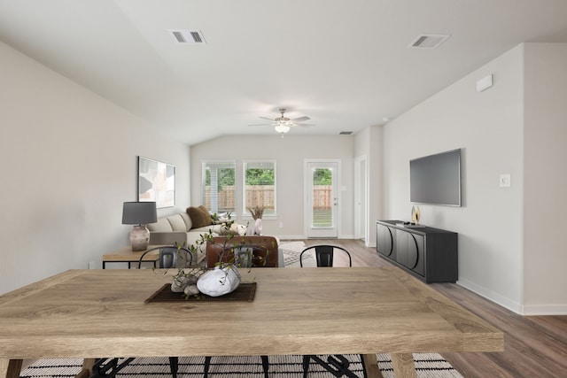 7746 Beaufort Ln, Baytown, TX 77523 - dining room featuring ceiling fan, wood finished floors, baseboards, and lofted ceiling