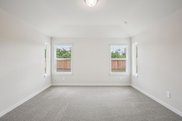 7746 Beaufort Ln, Baytown, TX 77523 - spare room featuring carpet floors and baseboards