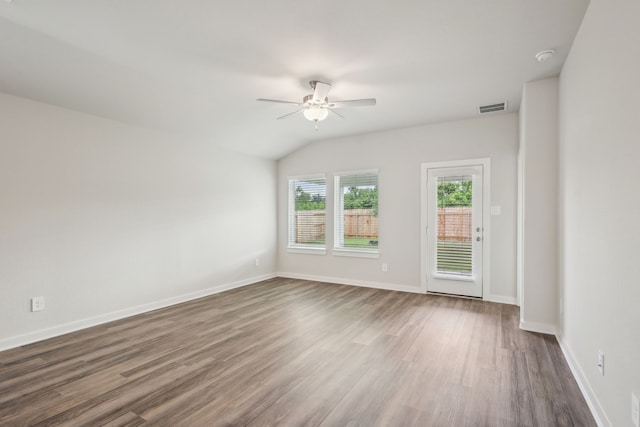 7746 Beaufort Ln, Baytown, TX 77523 - spare room featuring ceiling fan, dark wood-type flooring, and baseboards