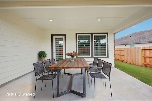 7746 Beaufort Ln, Baytown, TX 77523 - view of patio featuring outdoor dining space