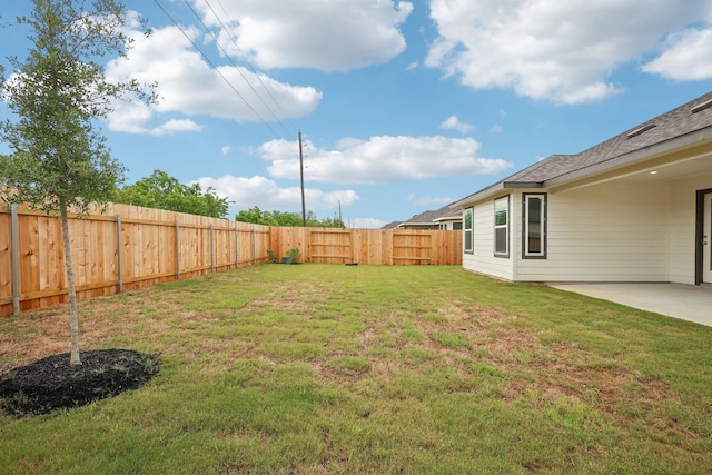 7746 Beaufort Ln, Baytown, TX 77523 - view of yard featuring a patio area