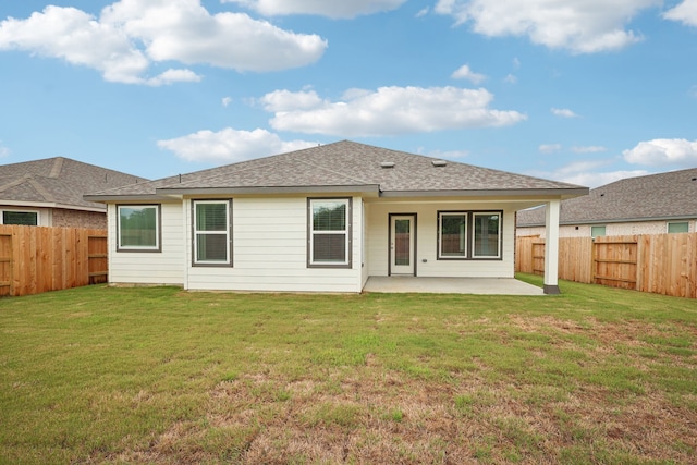 7746 Beaufort Ln, Baytown, TX 77523 - rear view of property featuring a patio area and a shingled roof