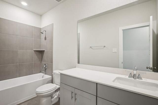 7746 Beaufort Ln, Baytown, TX 77523 - bathroom with toilet, vanity, shower / washtub combination, and recessed lighting