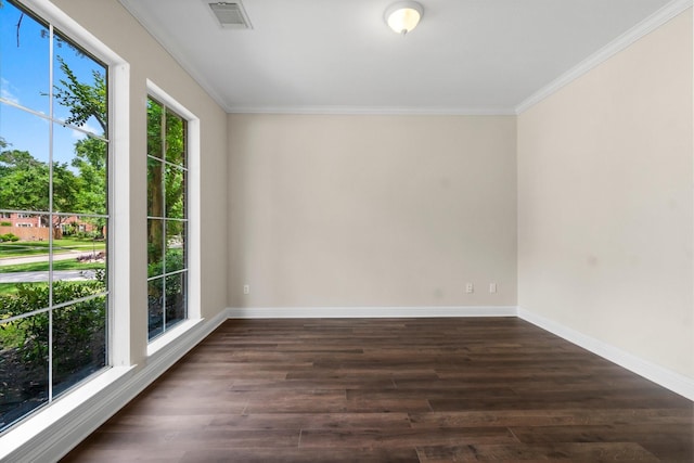 20960 Sweetwood Cir, Porter, TX 77365 - spare room featuring dark wood finished floors, baseboards, crown molding, and visible vents