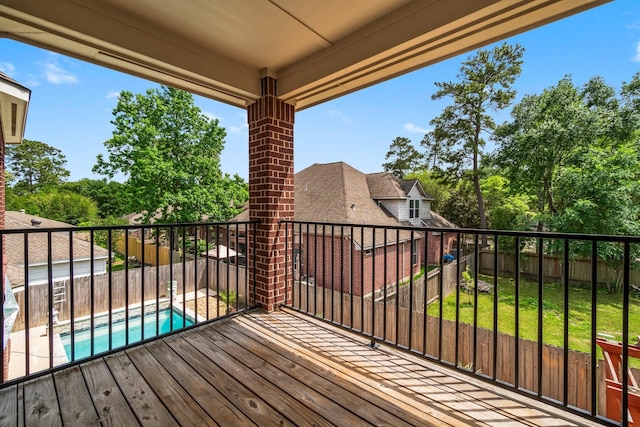 20960 Sweetwood Cir, Porter, TX 77365 - wooden terrace featuring a fenced backyard, a fenced in pool, and a lawn