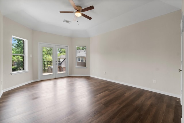 20960 Sweetwood Cir, Porter, TX 77365 - spare room with a ceiling fan, visible vents, a wealth of natural light, and dark wood-style flooring