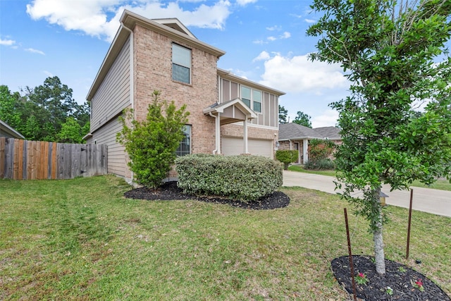 438 Camas Creek Ln, Magnolia, TX 77354 - view of front of property featuring fence, an attached garage, brick siding, concrete driveway, and a front lawn