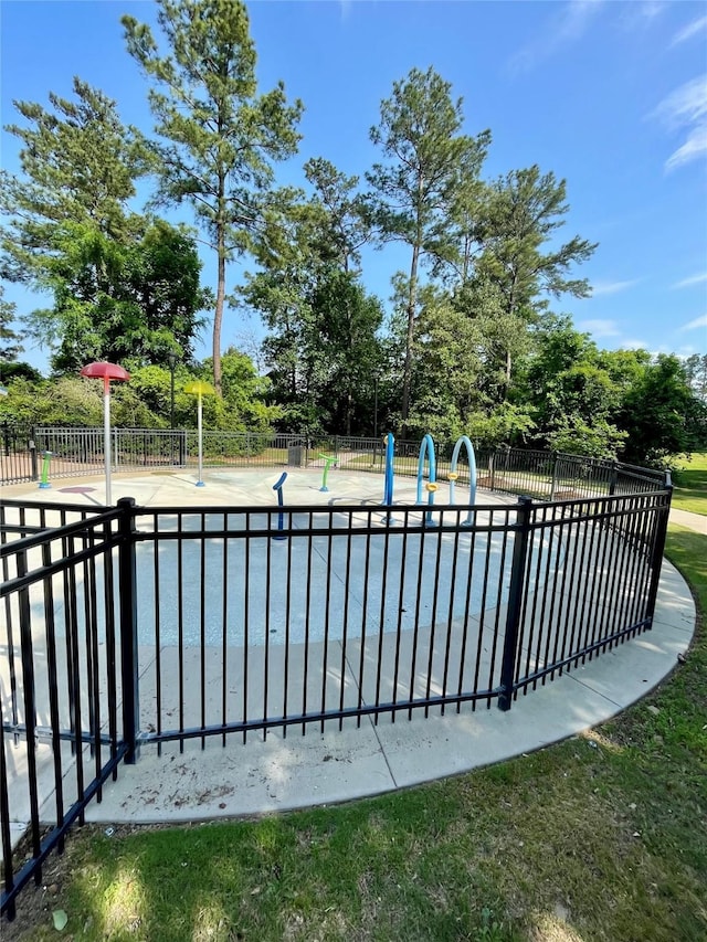 438 Camas Creek Ln, Magnolia, TX 77354 - view of pool with fence