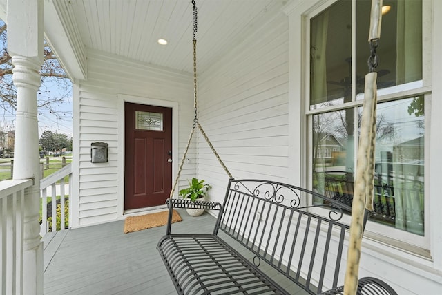 property entrance with covered porch