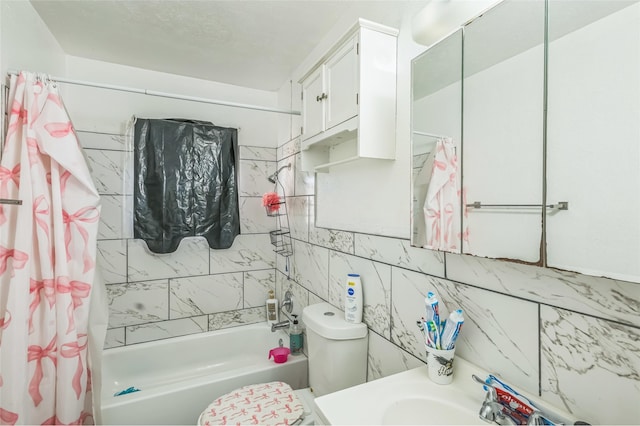 full bath with shower / bath combo with shower curtain, toilet, and a sink