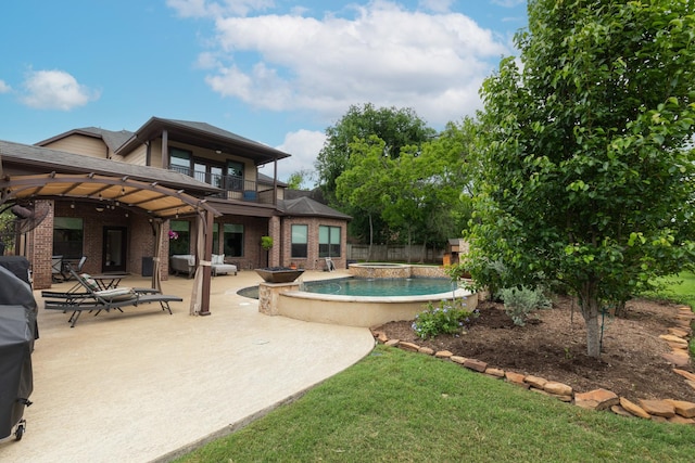 outdoor pool featuring a patio, a hot tub, and fence