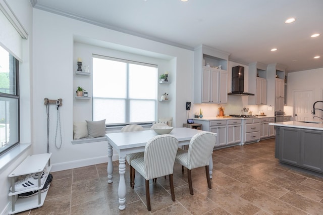 dining space with recessed lighting, baseboards, and stone finish floor