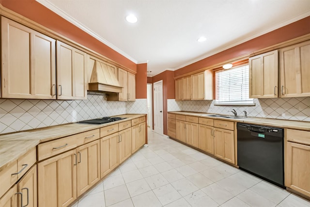 9402 Stockport Dr, Spring, TX 77379 - kitchen featuring black appliances, light brown cabinetry, custom exhaust hood, a sink, and crown molding