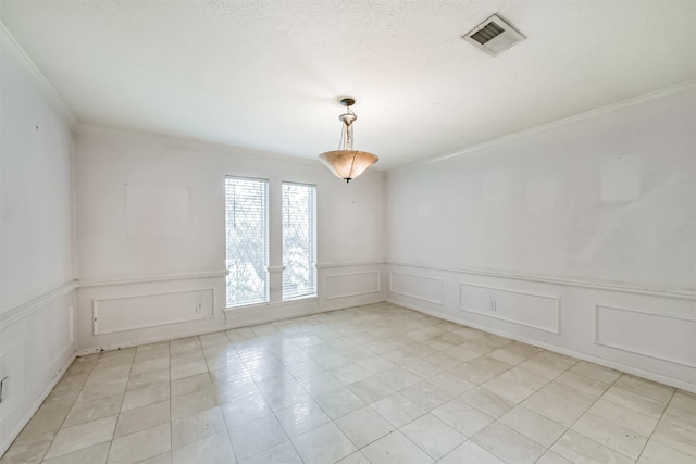 9402 Stockport Dr, Spring, TX 77379 - empty room featuring crown molding, a decorative wall, light tile patterned floors, and a wainscoted wall