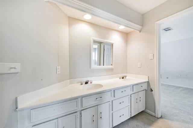 9402 Stockport Dr, Spring, TX 77379 - bathroom with double vanity and baseboards