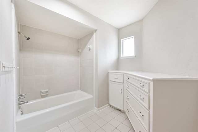 9402 Stockport Dr, Spring, TX 77379 - bathroom featuring tile patterned floors, shower / bath combination, and baseboards