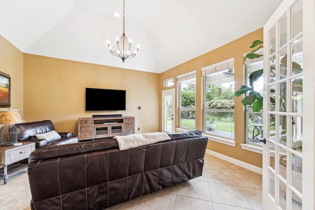living room featuring baseboards, high vaulted ceiling, a notable chandelier, and light tile patterned floors