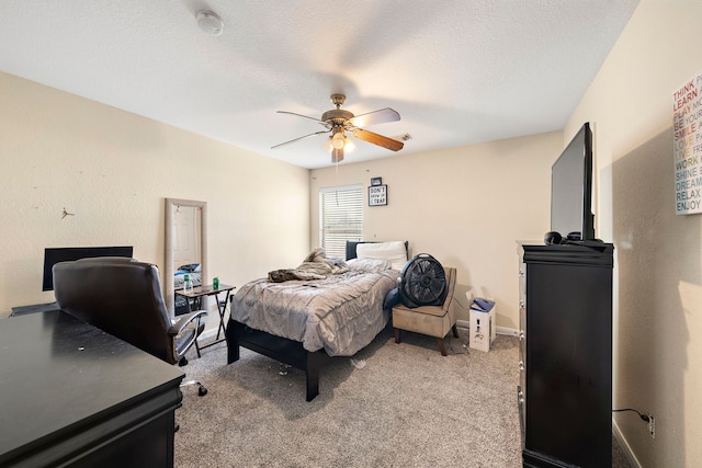 bedroom featuring light carpet and ceiling fan