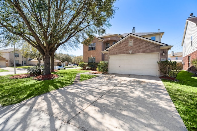 traditional-style home featuring a front lawn, brick siding, driveway, and a garage