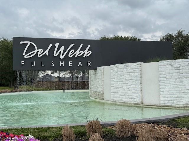 view of community sign