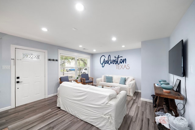 1211 35th St, Galveston, TX 77550 - living room with recessed lighting, wood finished floors, visible vents, and baseboards