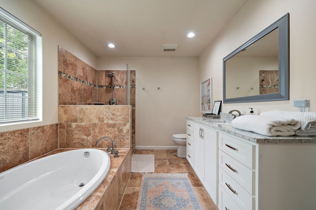 1211 35th St, Galveston, TX 77550 - bathroom featuring a garden tub, vanity, toilet, a walk in shower, and recessed lighting