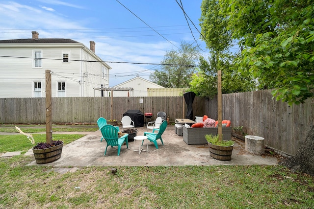 1211 35th St, Galveston, TX 77550 - view of patio featuring an outdoor living space with a fire pit, a fenced backyard, and a grill