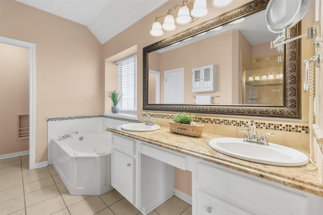 full bathroom featuring vaulted ceiling, tile patterned flooring, and a sink