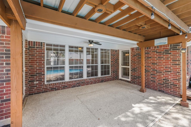 view of patio featuring ceiling fan