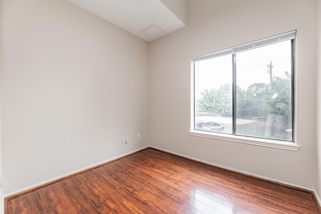 2023 Gentryside Dr Unit 508, Houston, TX 77077 - unfurnished room with baseboards, vaulted ceiling, dark wood-style floors, and a healthy amount of sunlight