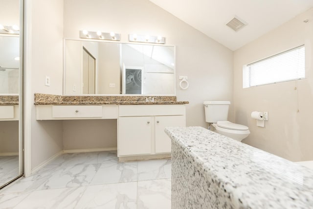 2023 Gentryside Dr Unit 508, Houston, TX 77077 - full bathroom featuring toilet, vanity, marble finish floor, lofted ceiling, and visible vents